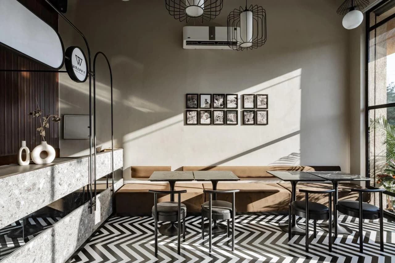 Wrappit cafe interior with marble counter and herringbone floor