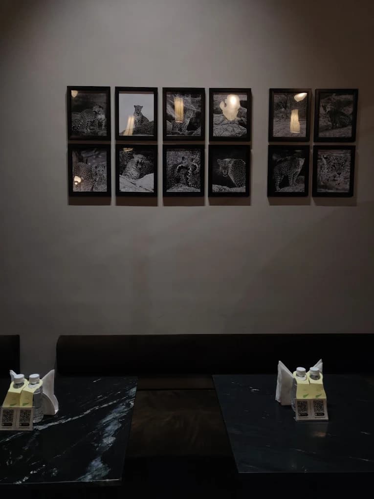 Black and white leopard photo wall at Wrappit